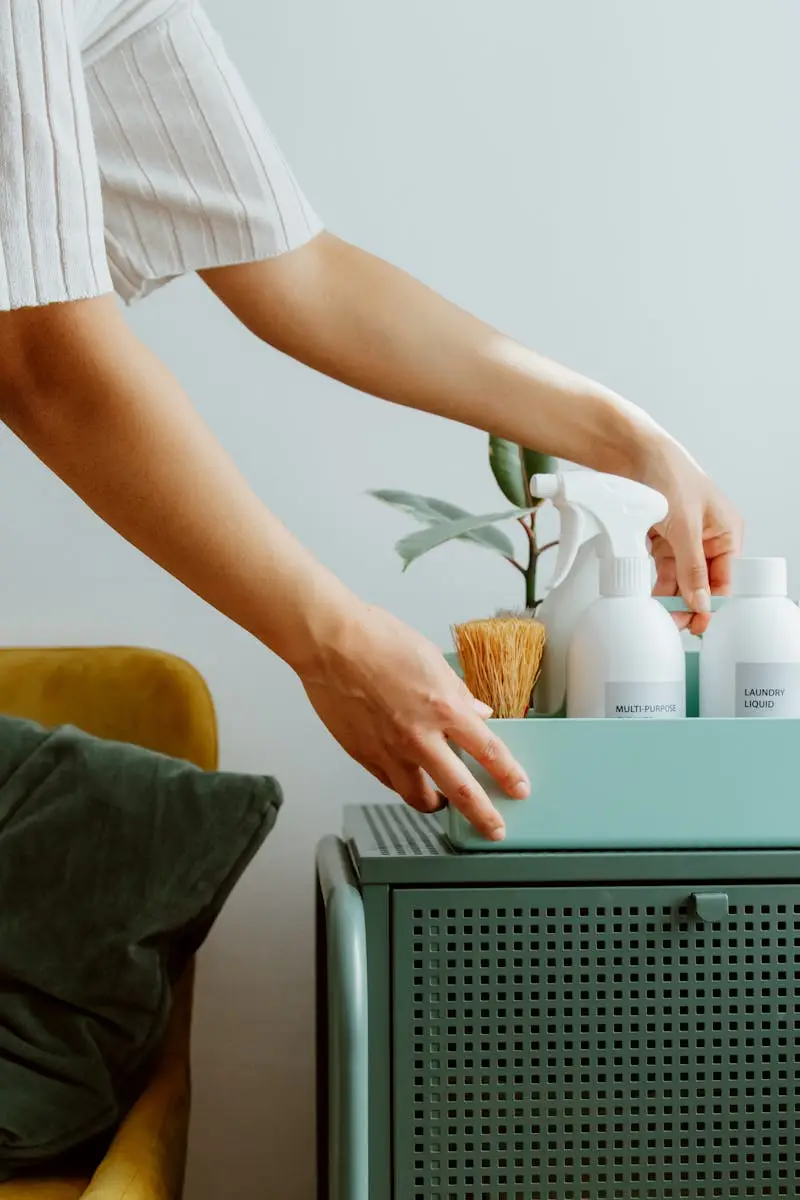 A woman organizes self-care products in a stylish room, embodying minimalism and tranquility.